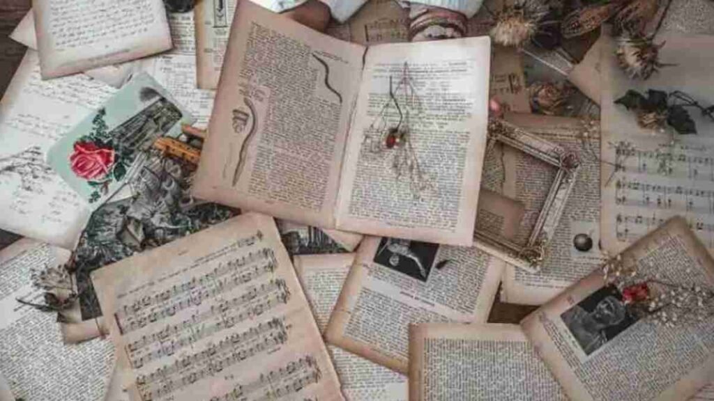 poems about hope, scattered pages and dried flowers