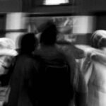 Blurred crowd on a train platform, a poem about someone you met once